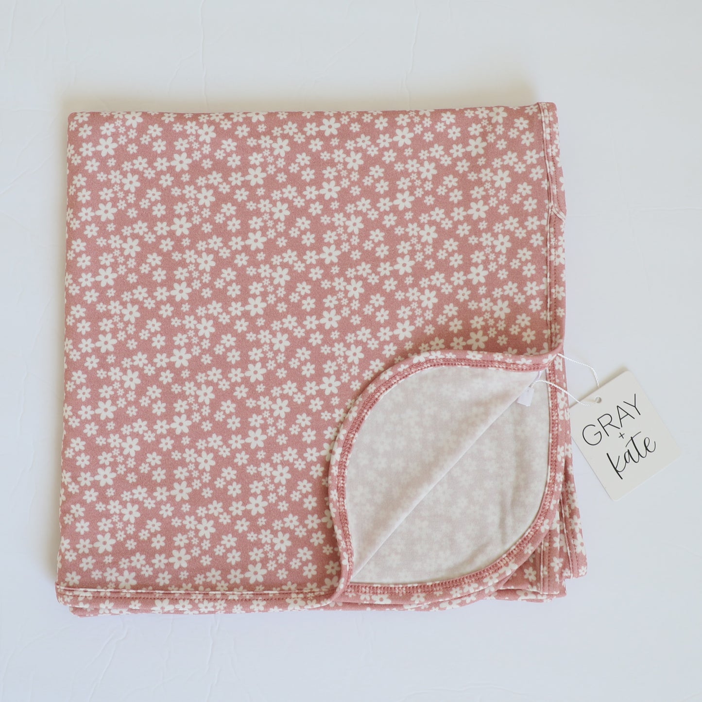 BLUSH FLORAL SWADDLE